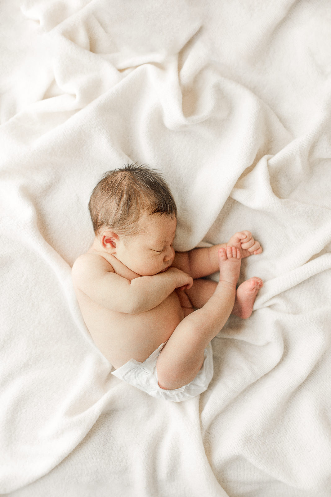 newborn studio photos that are less posed