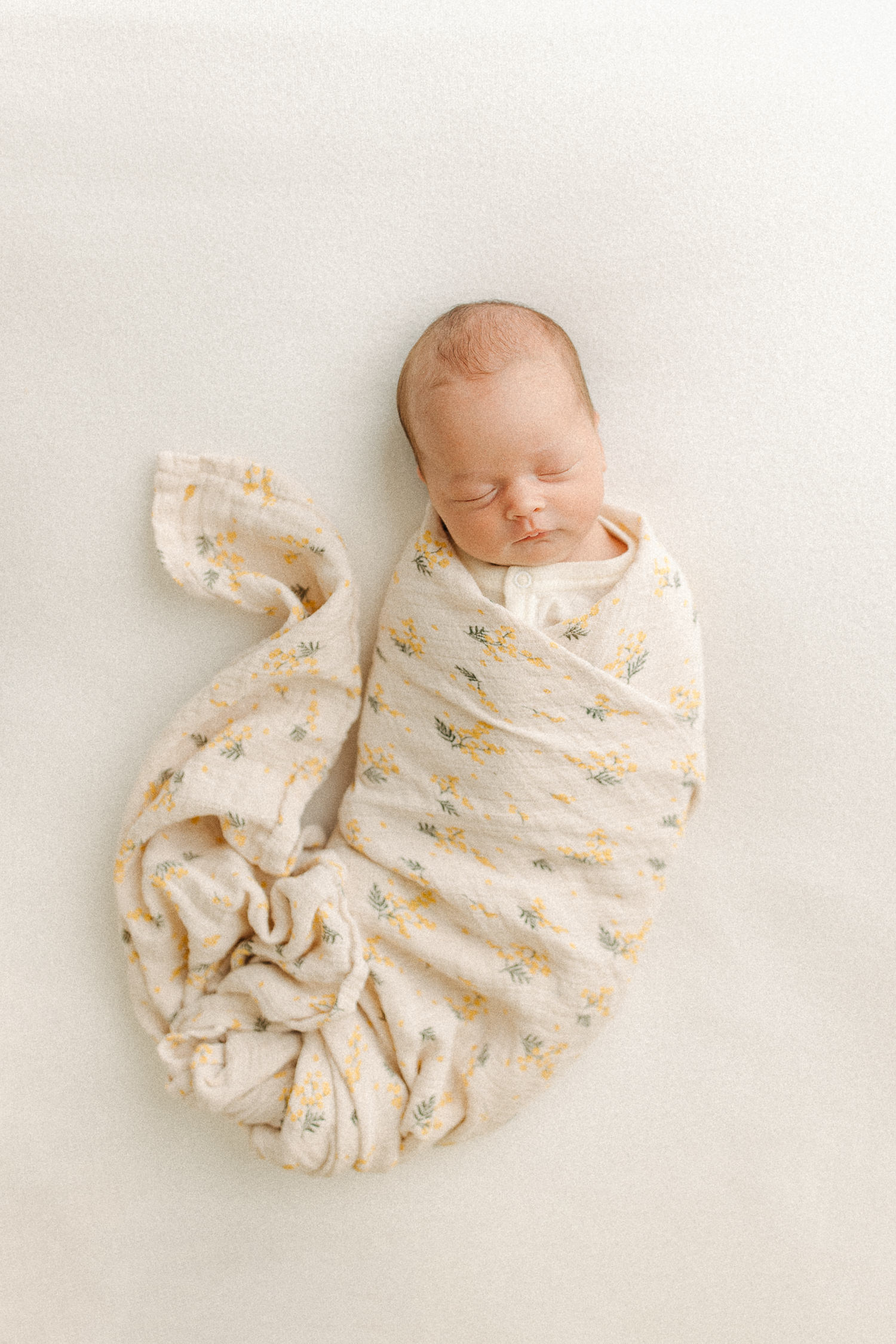 swaddled newborn photography