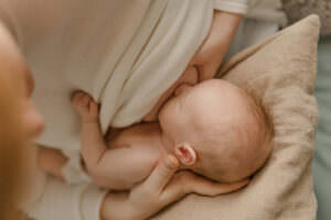 breastfeeding during studio newborn photo session