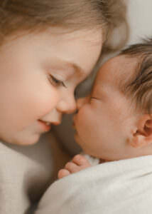 studio newborn session with sibling
