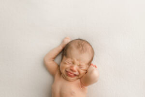 candid newborn photographer