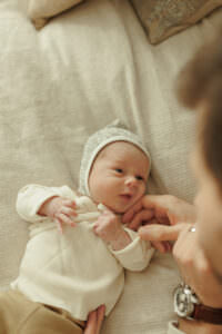 candid style newborn photos at home