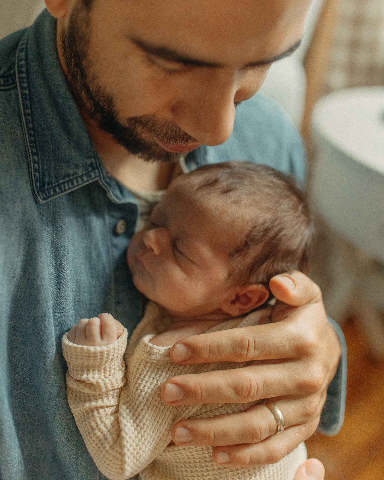 candid in-home newborn photographer