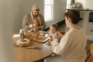 candid newborn photos at home with family